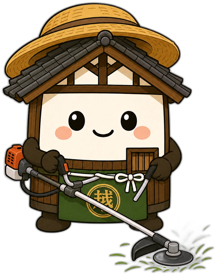麦わら帽子をかぶって草刈りをする越太郎