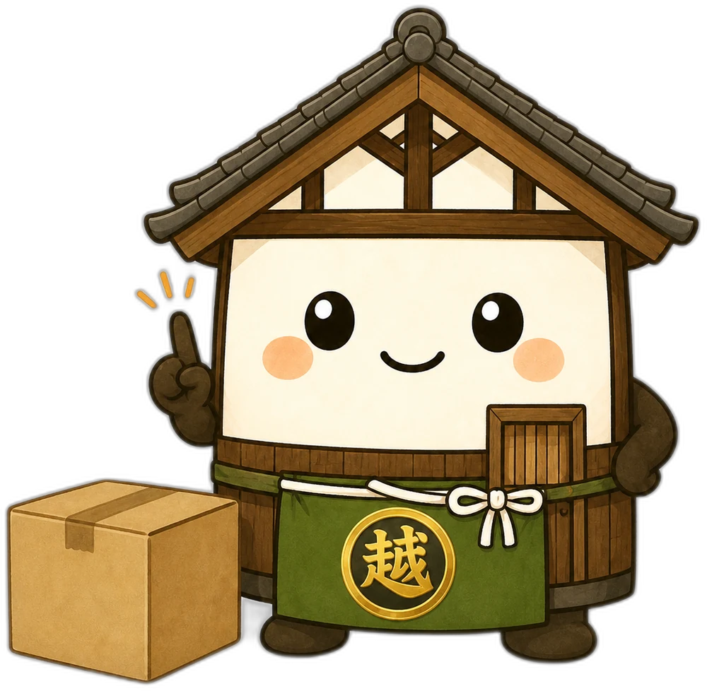 荷物の前で注意をうながす越太郎