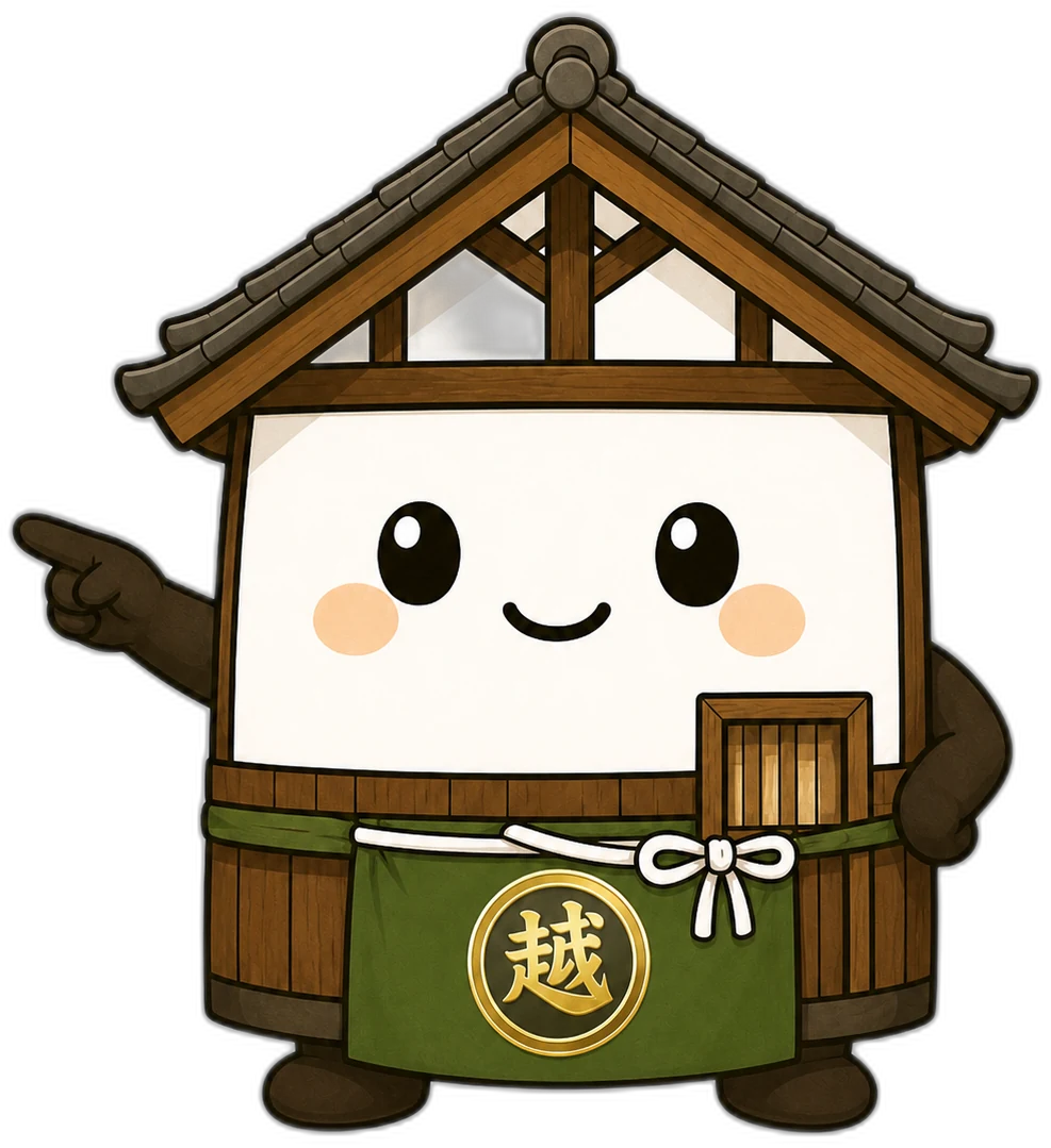 田んぼの前で説明する越太郎